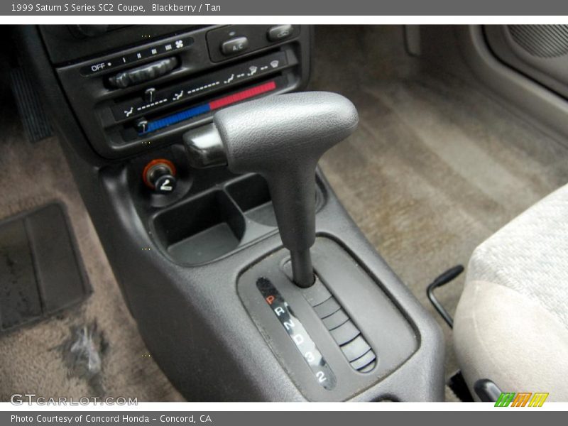 Blackberry / Tan 1999 Saturn S Series SC2 Coupe