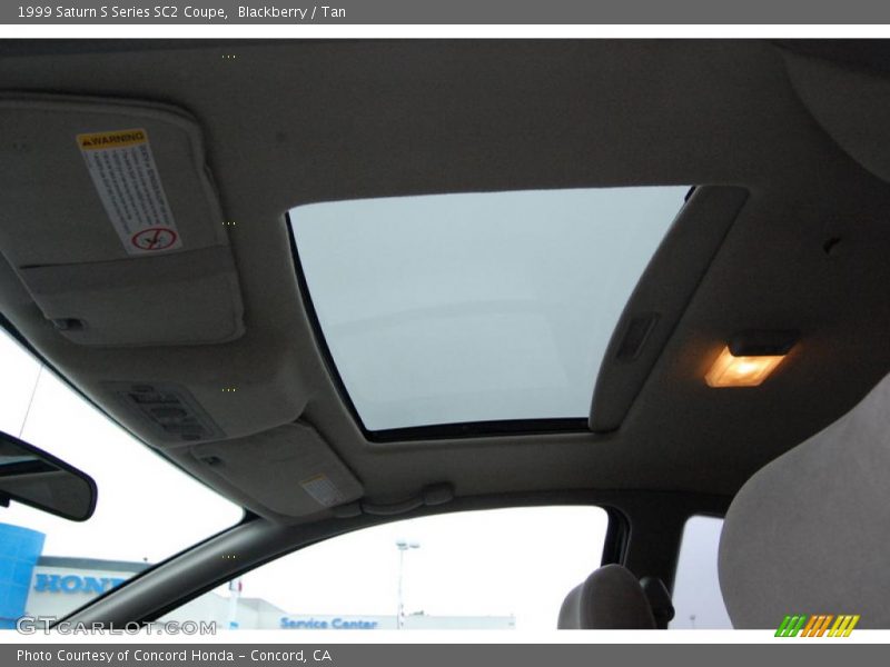 Blackberry / Tan 1999 Saturn S Series SC2 Coupe