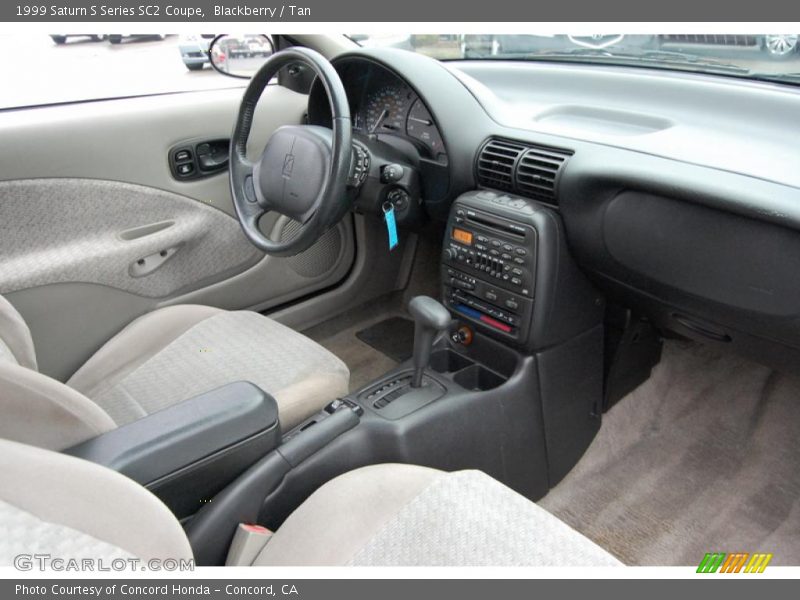 Blackberry / Tan 1999 Saturn S Series SC2 Coupe