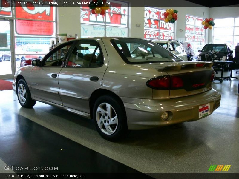 Light Taupe Metallic / Taupe 2002 Pontiac Sunfire SE Sedan