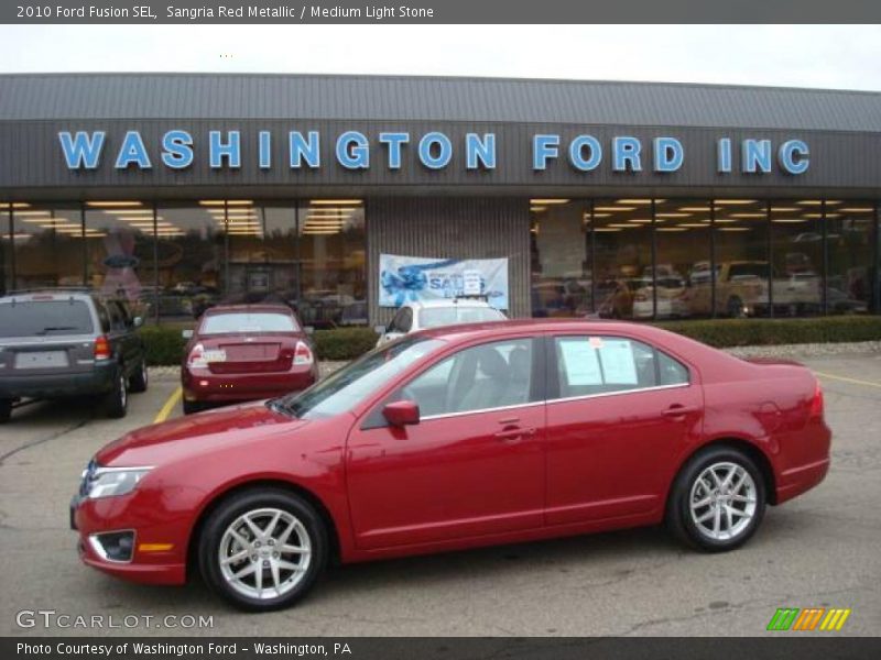 Sangria Red Metallic / Medium Light Stone 2010 Ford Fusion SEL