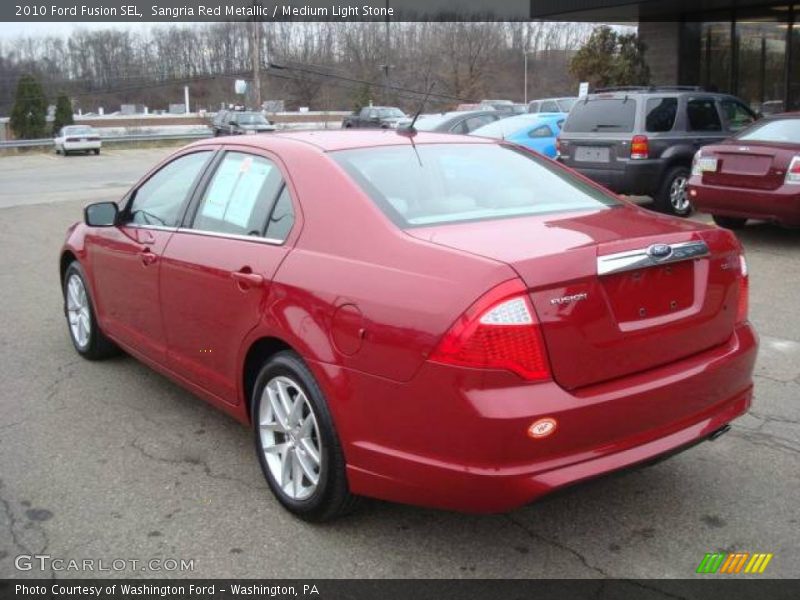 Sangria Red Metallic / Medium Light Stone 2010 Ford Fusion SEL
