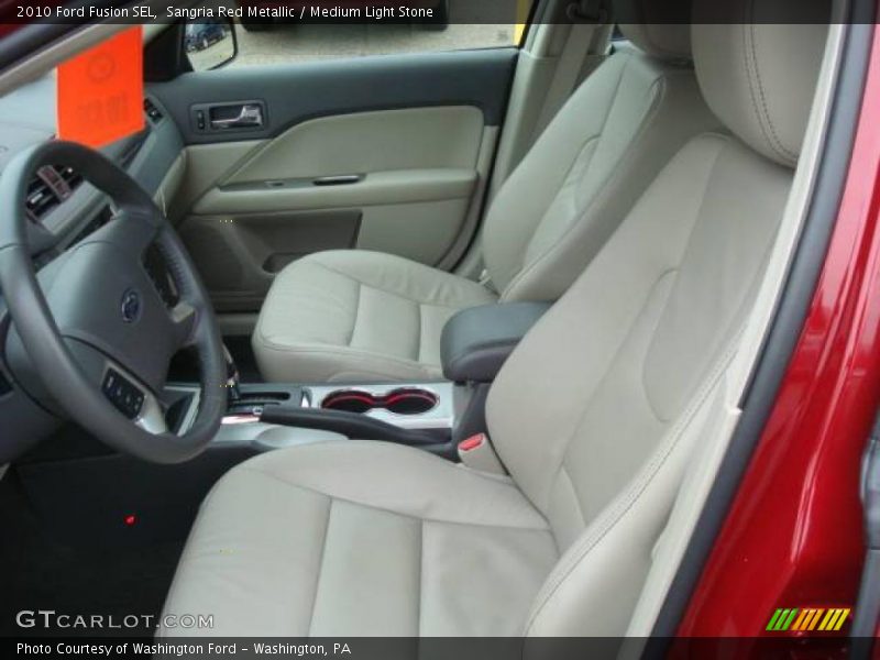 Sangria Red Metallic / Medium Light Stone 2010 Ford Fusion SEL