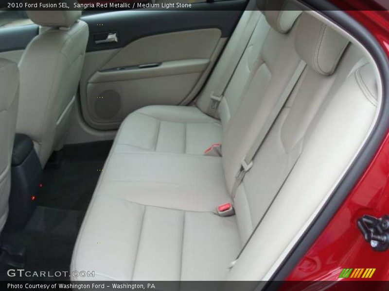 Sangria Red Metallic / Medium Light Stone 2010 Ford Fusion SEL