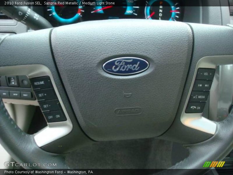 Sangria Red Metallic / Medium Light Stone 2010 Ford Fusion SEL