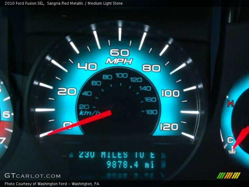 Sangria Red Metallic / Medium Light Stone 2010 Ford Fusion SEL