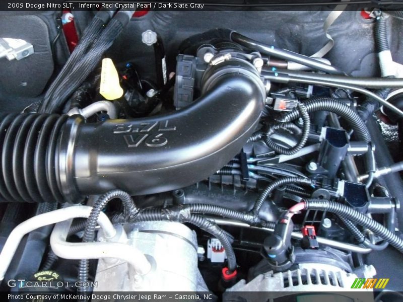 Inferno Red Crystal Pearl / Dark Slate Gray 2009 Dodge Nitro SLT