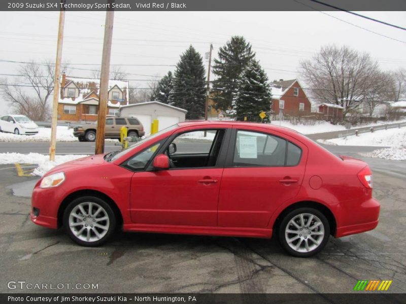 Vivid Red / Black 2009 Suzuki SX4 Technology Sport Sedan