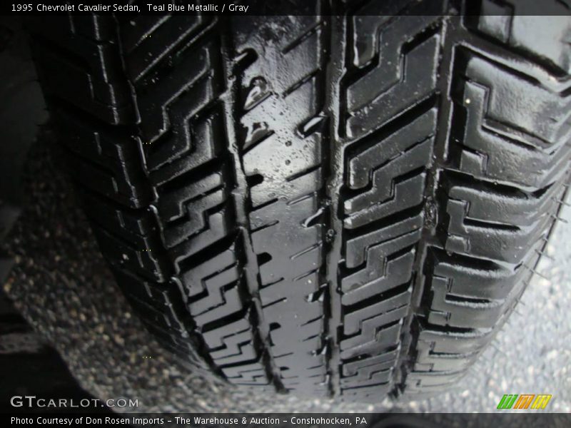 Teal Blue Metallic / Gray 1995 Chevrolet Cavalier Sedan