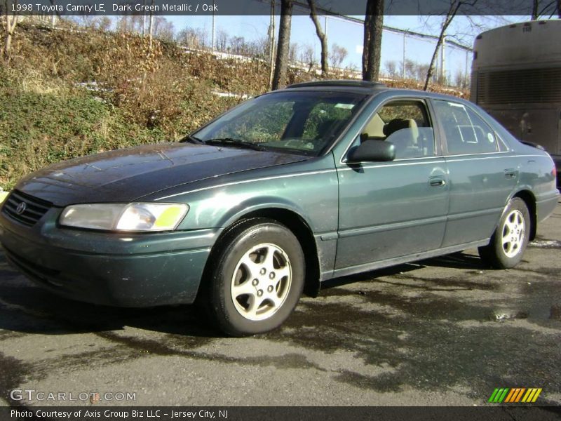 Dark Green Metallic / Oak 1998 Toyota Camry LE