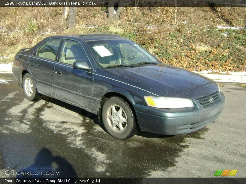 Dark Green Metallic / Oak 1998 Toyota Camry LE