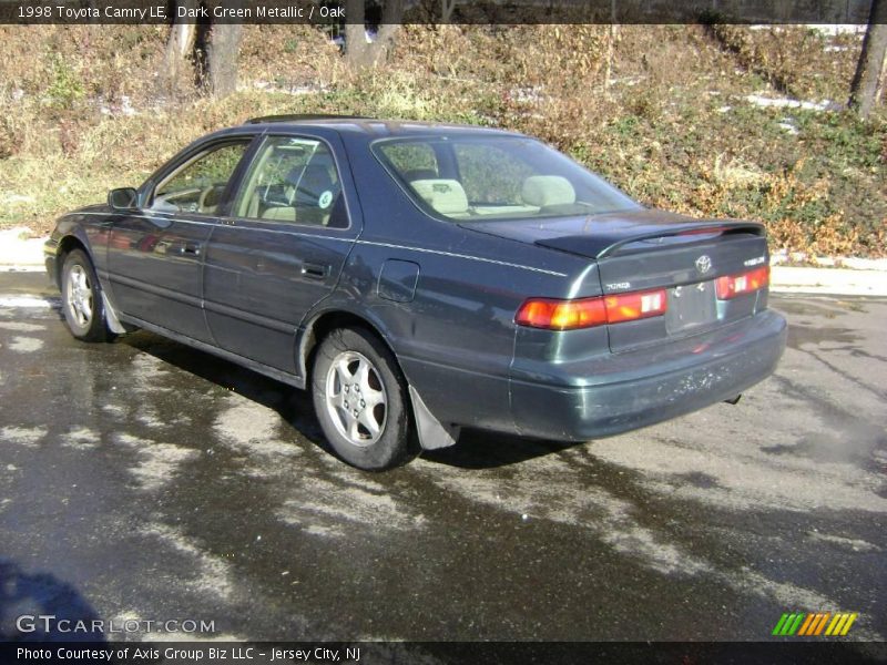 Dark Green Metallic / Oak 1998 Toyota Camry LE