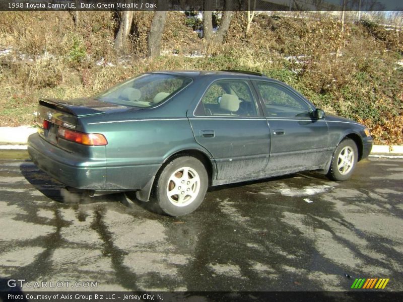 Dark Green Metallic / Oak 1998 Toyota Camry LE