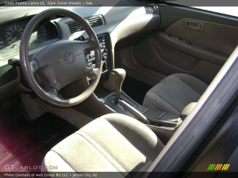 Dark Green Metallic / Oak 1998 Toyota Camry LE