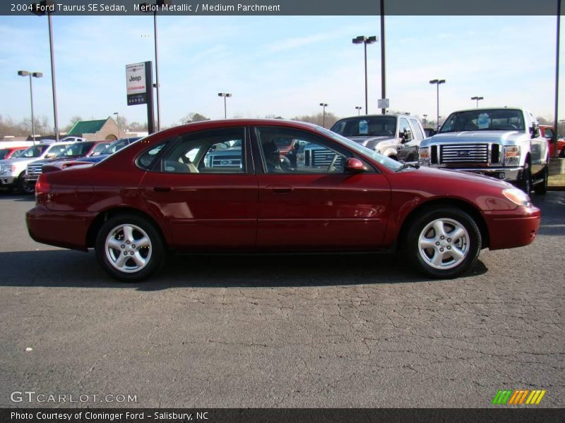 Merlot Metallic / Medium Parchment 2004 Ford Taurus SE Sedan