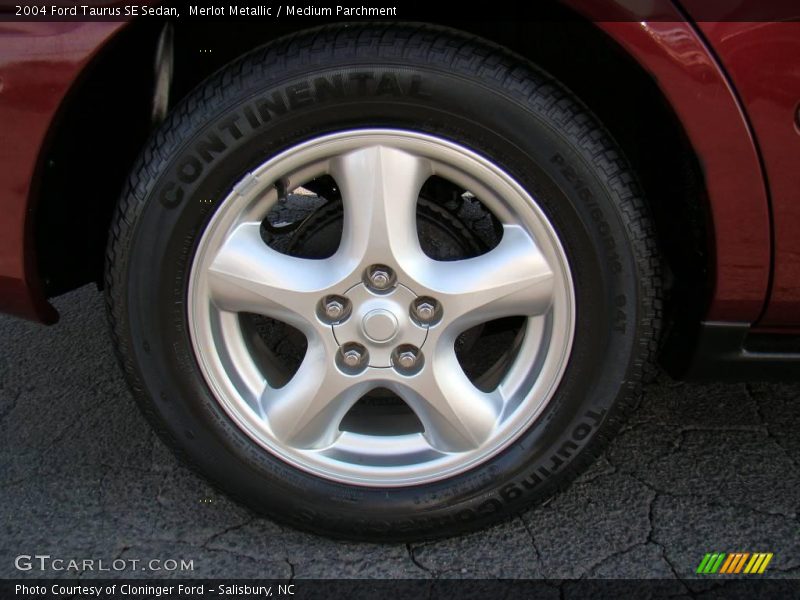 Merlot Metallic / Medium Parchment 2004 Ford Taurus SE Sedan