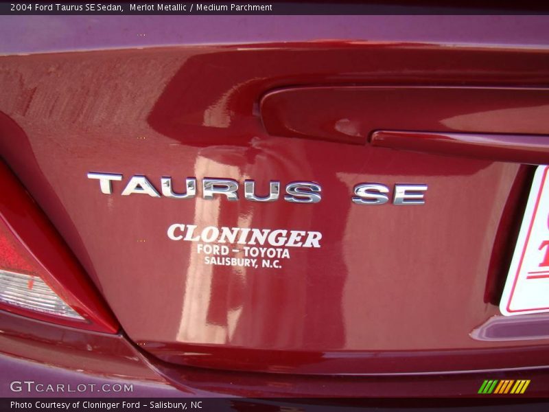 Merlot Metallic / Medium Parchment 2004 Ford Taurus SE Sedan
