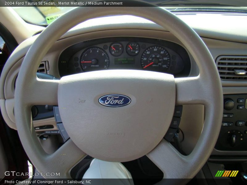 Merlot Metallic / Medium Parchment 2004 Ford Taurus SE Sedan