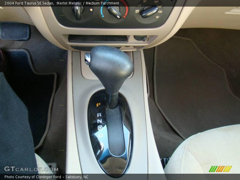 Merlot Metallic / Medium Parchment 2004 Ford Taurus SE Sedan