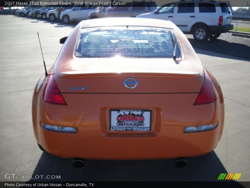 Solar Orange Pearl / Carbon 2007 Nissan 350Z Enthusiast Coupe
