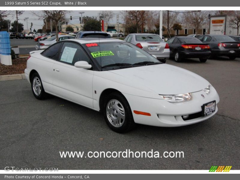 White / Black 1999 Saturn S Series SC2 Coupe