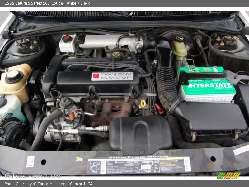 White / Black 1999 Saturn S Series SC2 Coupe