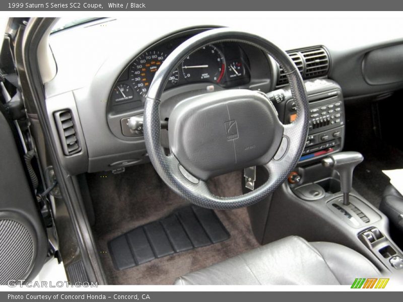White / Black 1999 Saturn S Series SC2 Coupe