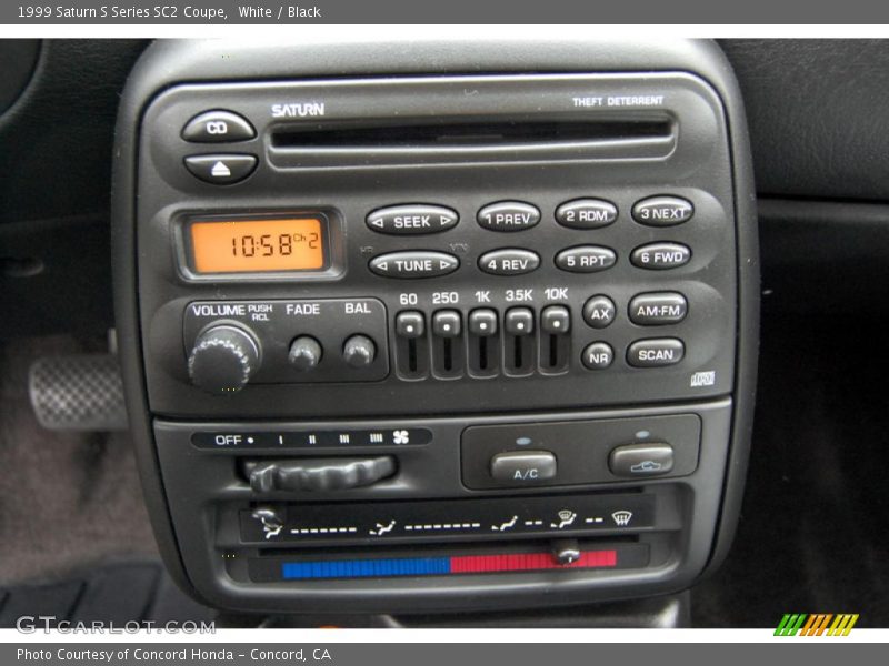White / Black 1999 Saturn S Series SC2 Coupe