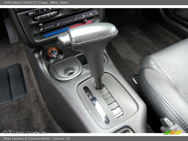 White / Black 1999 Saturn S Series SC2 Coupe