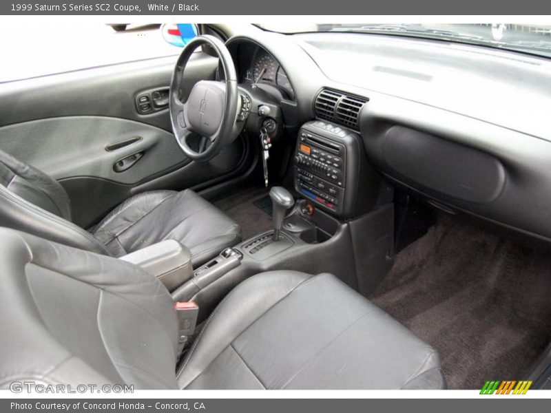 White / Black 1999 Saturn S Series SC2 Coupe