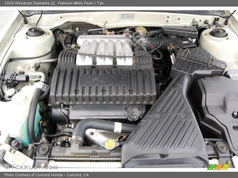 Platinum White Pearl / Tan 2000 Mitsubishi Diamante LS