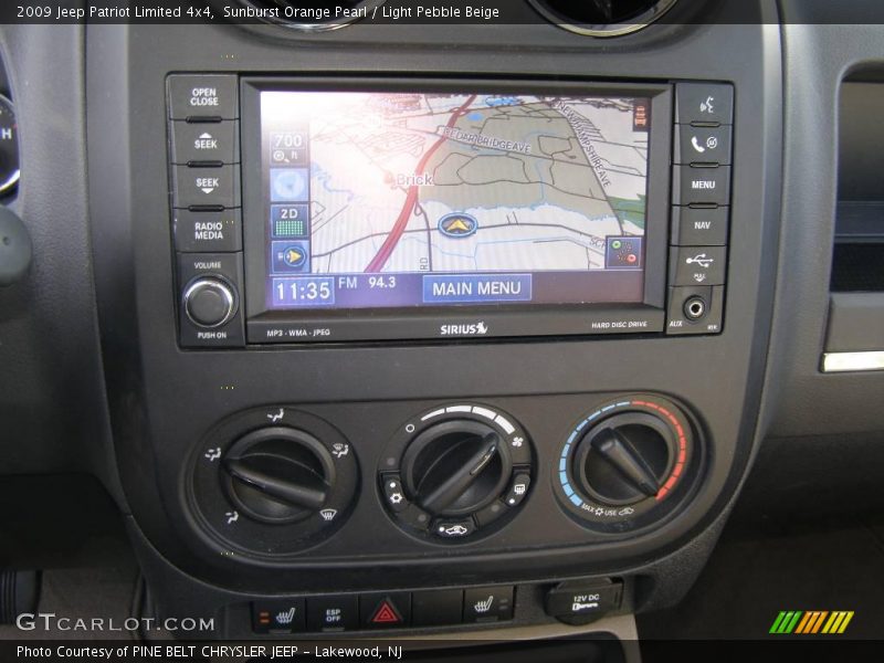 Sunburst Orange Pearl / Light Pebble Beige 2009 Jeep Patriot Limited 4x4