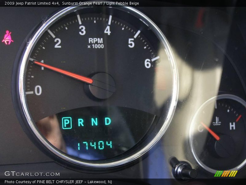 Sunburst Orange Pearl / Light Pebble Beige 2009 Jeep Patriot Limited 4x4