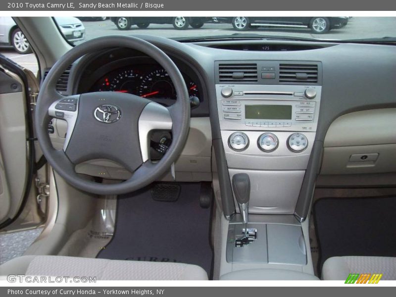 Sandy Beach Metallic / Bisque 2010 Toyota Camry LE