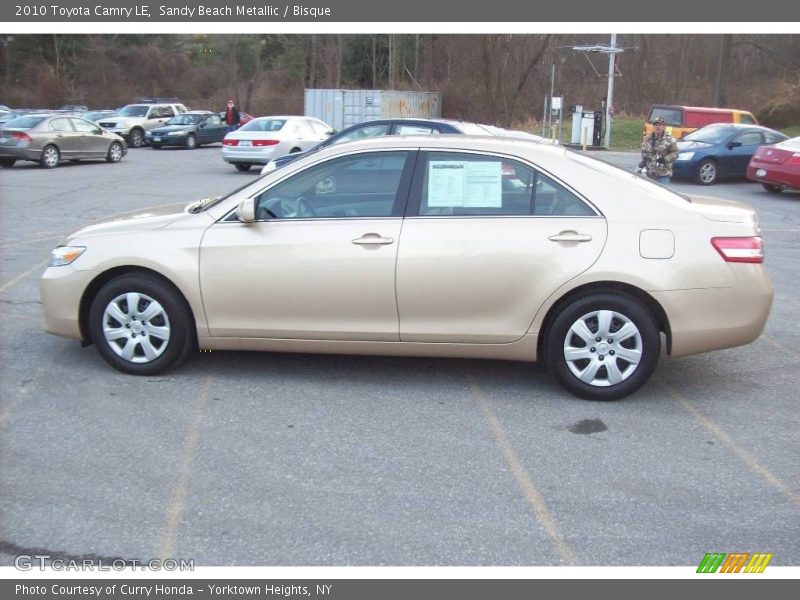  2010 Camry LE Sandy Beach Metallic