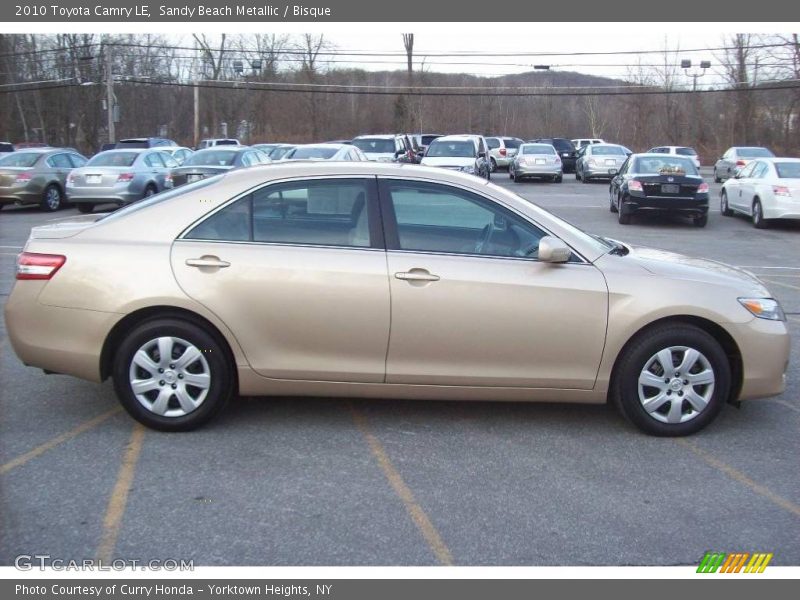 Sandy Beach Metallic / Bisque 2010 Toyota Camry LE