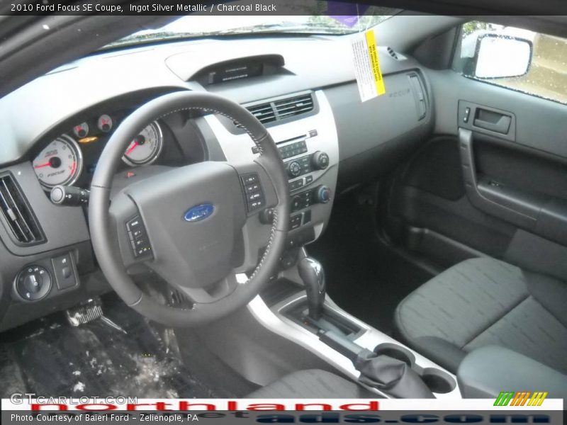 Ingot Silver Metallic / Charcoal Black 2010 Ford Focus SE Coupe