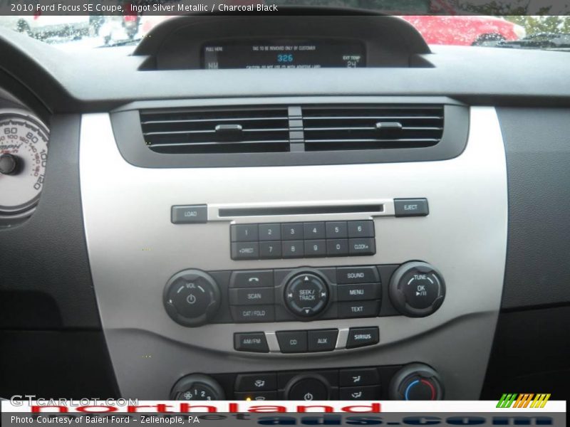 Ingot Silver Metallic / Charcoal Black 2010 Ford Focus SE Coupe