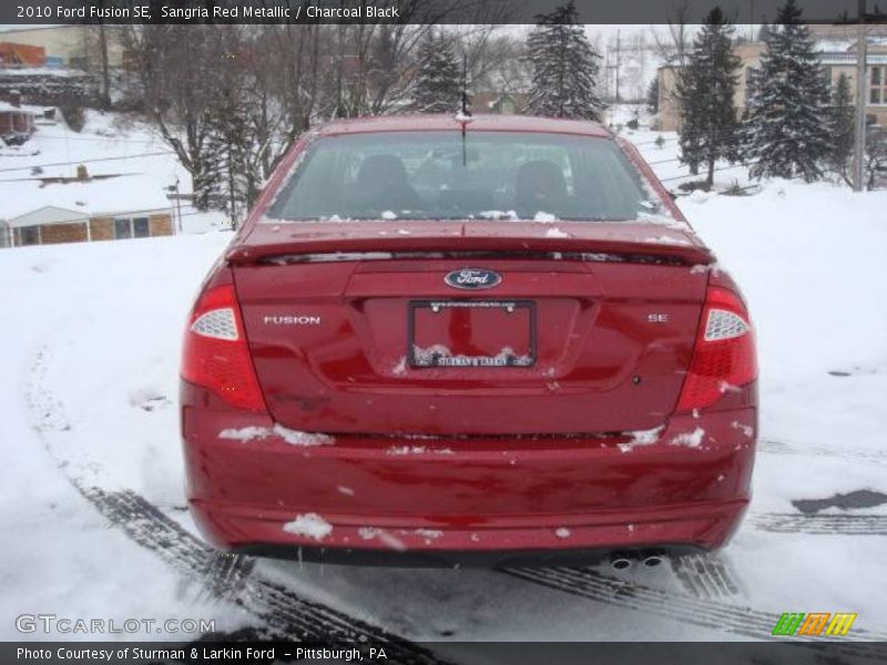 Sangria Red Metallic / Charcoal Black 2010 Ford Fusion SE