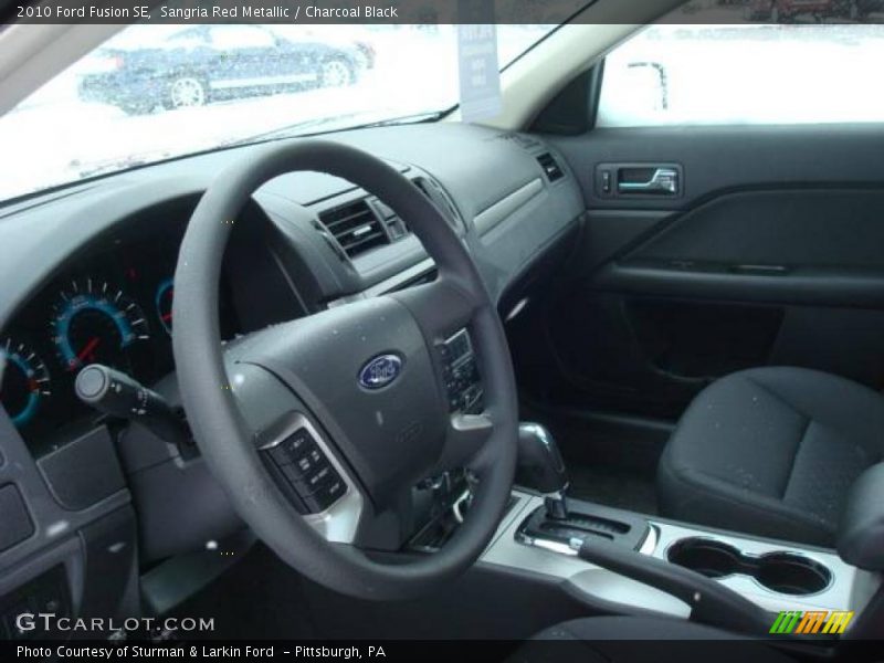 Sangria Red Metallic / Charcoal Black 2010 Ford Fusion SE