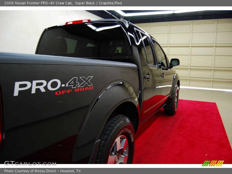 Super Black / Graphite/Red 2009 Nissan Frontier PRO-4X Crew Cab