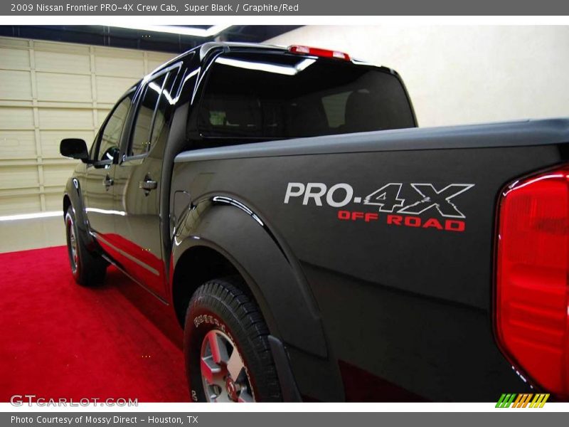Super Black / Graphite/Red 2009 Nissan Frontier PRO-4X Crew Cab