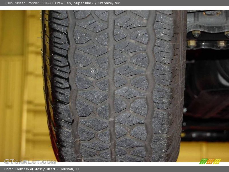 Super Black / Graphite/Red 2009 Nissan Frontier PRO-4X Crew Cab