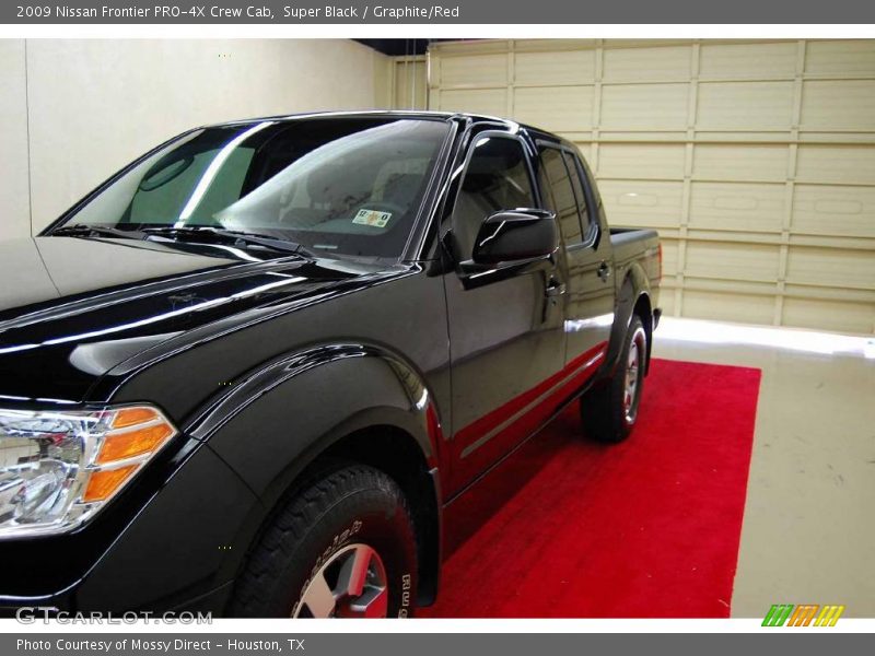 Super Black / Graphite/Red 2009 Nissan Frontier PRO-4X Crew Cab