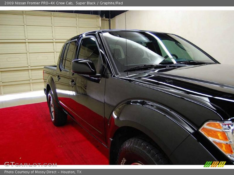 Super Black / Graphite/Red 2009 Nissan Frontier PRO-4X Crew Cab