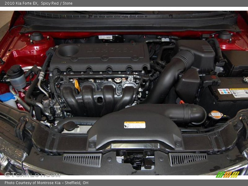 Spicy Red / Stone 2010 Kia Forte EX