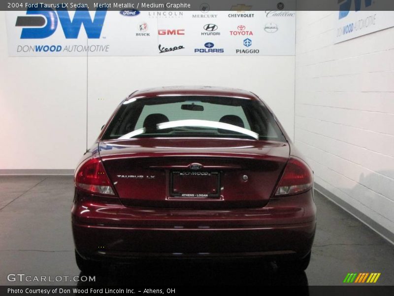 Merlot Metallic / Medium Graphite 2004 Ford Taurus LX Sedan