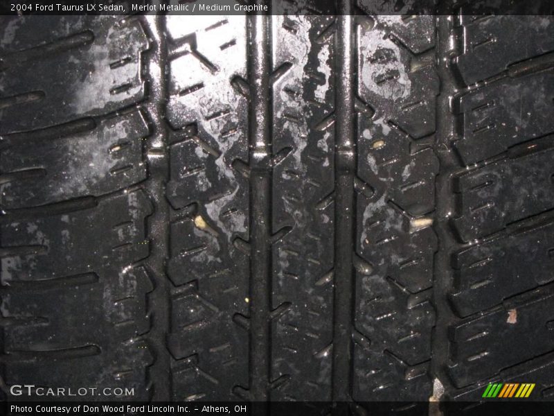 Merlot Metallic / Medium Graphite 2004 Ford Taurus LX Sedan