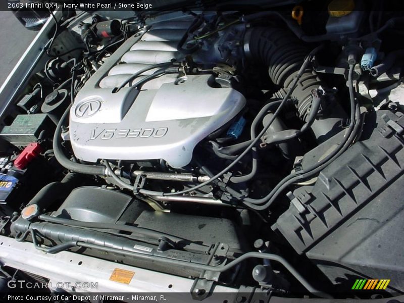 Ivory White Pearl / Stone Beige 2003 Infiniti QX4