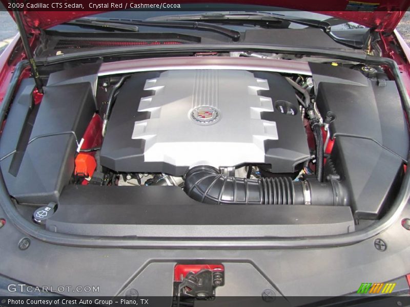 Crystal Red / Cashmere/Cocoa 2009 Cadillac CTS Sedan